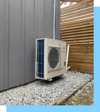Technician working on residential cooling equipment