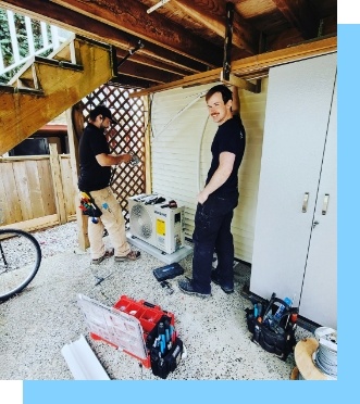 heat pump installation with two workers